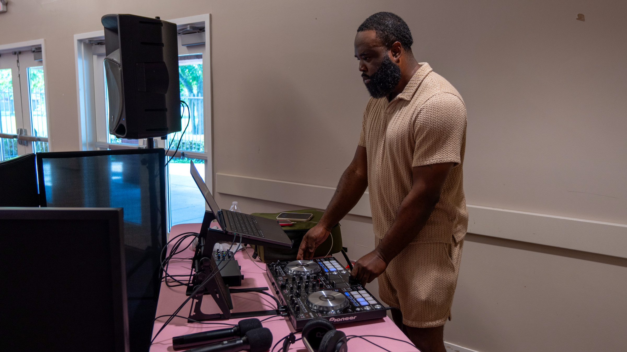 Controller, speaker, and microphone set up for an event