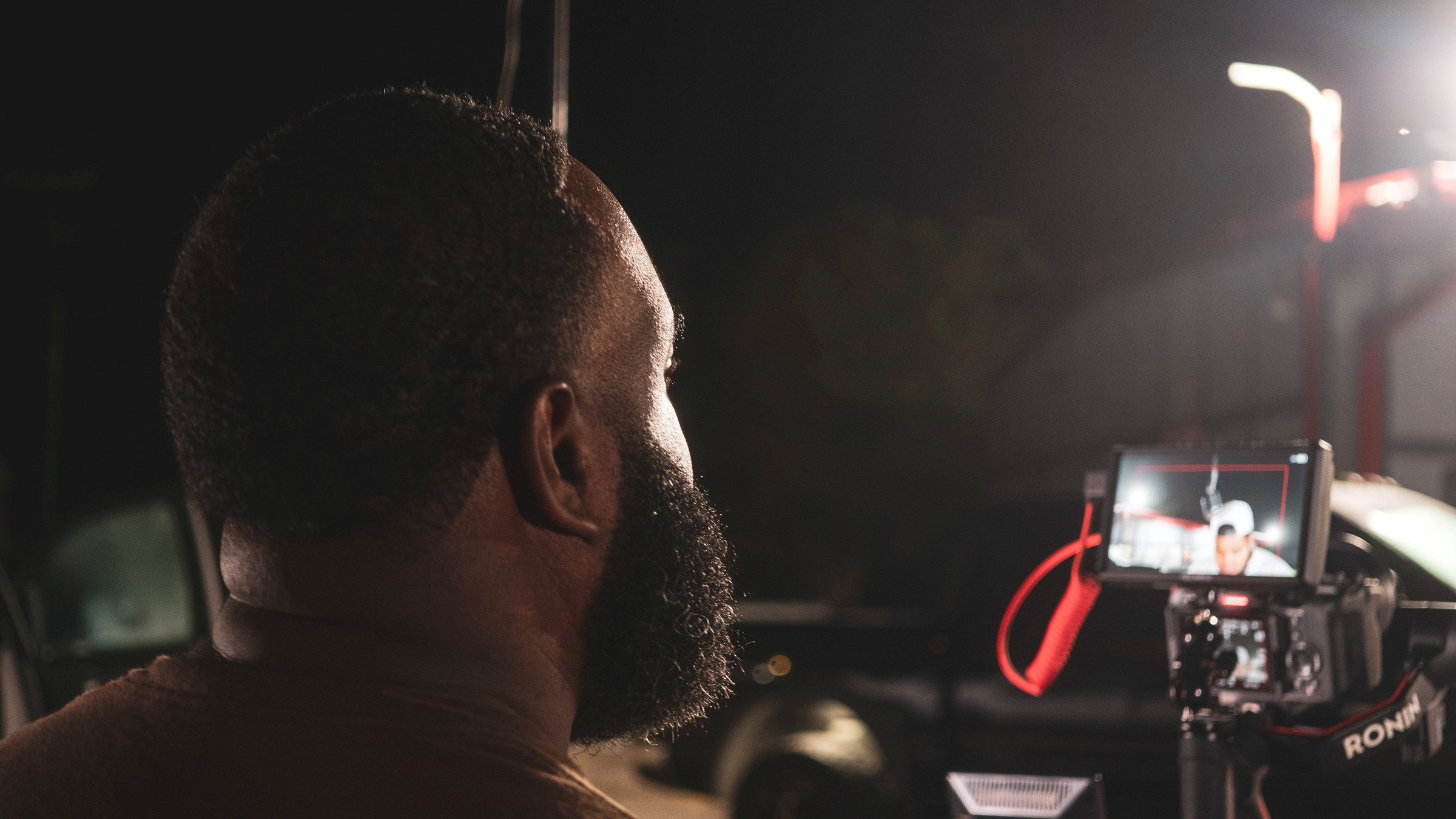 Monitoring a shot on location at night